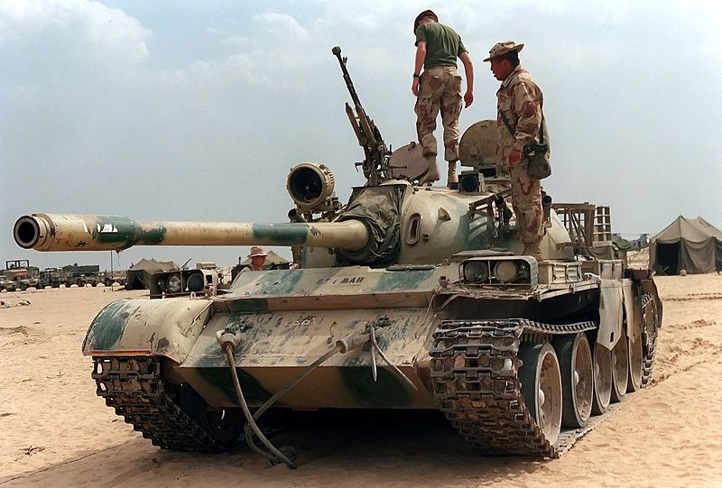 Iraqi Type 69-II examined by GIs - Credits wikipedia commons