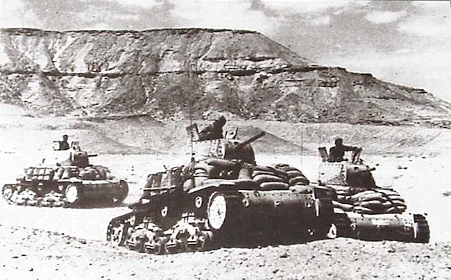 M13/40 Italian tanks on patrol in North Africa