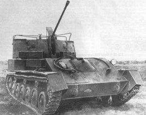 A ZSU-37 with the tarpaulin supports visible.