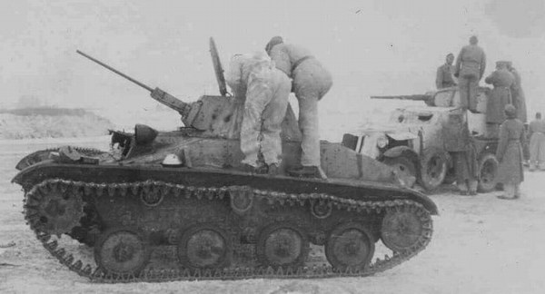 A Soviet crew prepare their winterized T-60. A BA-10 is in the background.