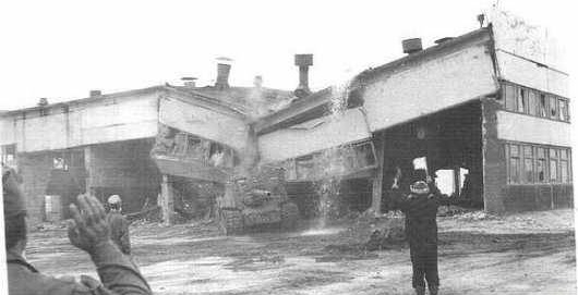 An ISU-152 knocks down a building at Chernobyl, 1984.