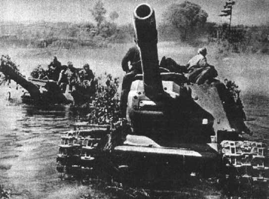 A very dramatic photo of a pair of ISU-152s fording a river