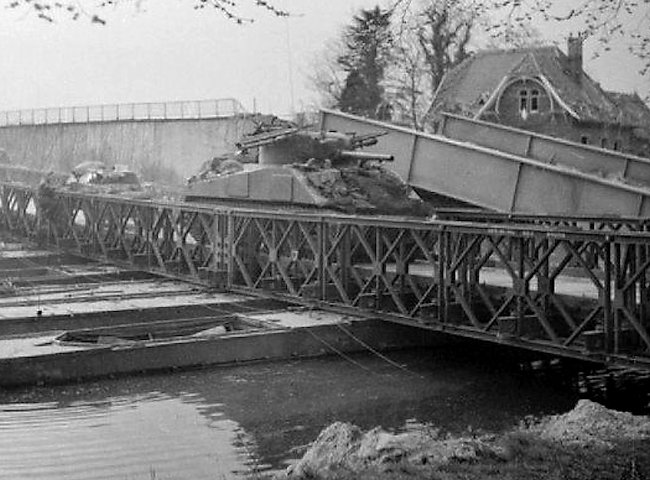 Sherman tank of the 1st Coldstream Guards, crossing a pontoon bridge over the Dortmund-Ems Canal, 6 April 1945