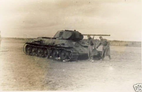 A completely different type of T-34, with a welded turret, the early track and the early driver vision hatch