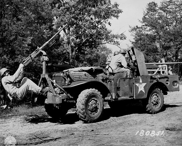 Improvised front mount for a M2 HMG cal.50 (12.7 mm) on a M6 GMC. It was used for anti-aircraft protection - Photo: Olive-Drab.com