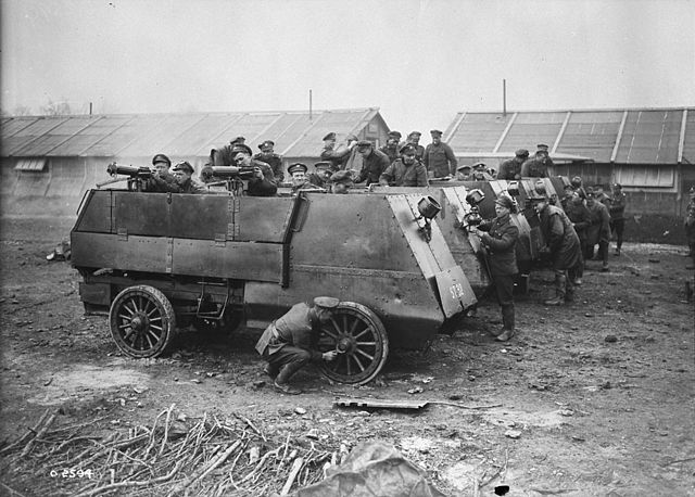 Cleaning armoured cars, Canadian Motor Machine Gun Brigade, April 1918