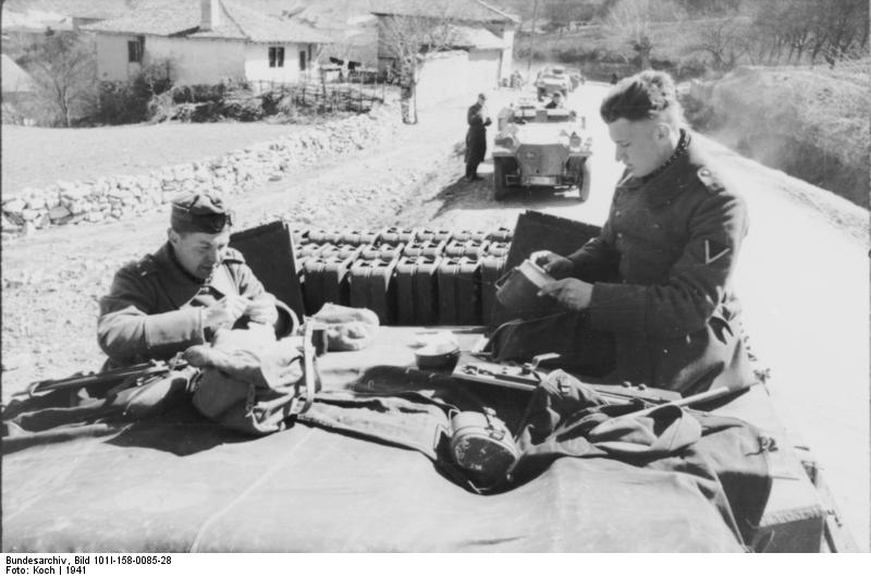 StuG crew on their vehicle