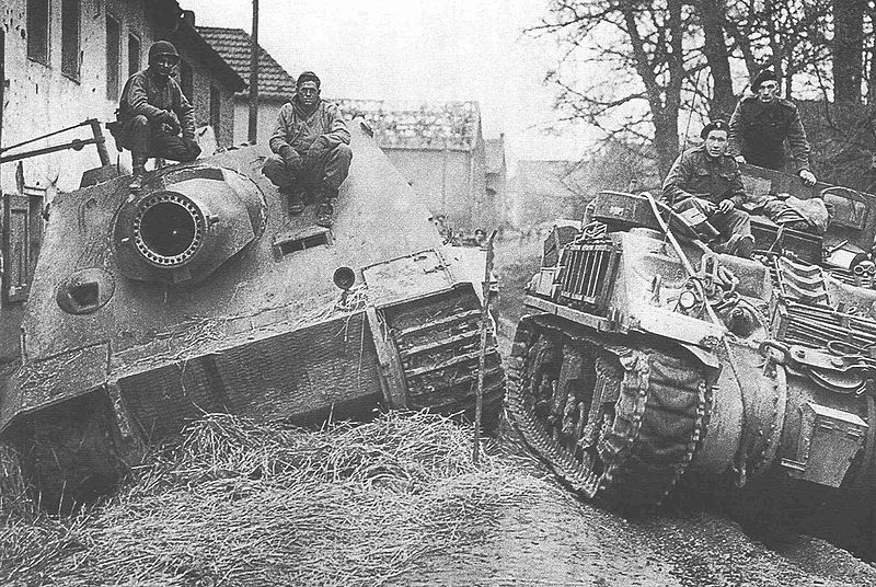 Abandoned Sturmtiger and Sherman ARV