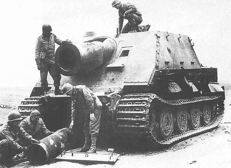 Abandoned Sturmtiger with American GIs